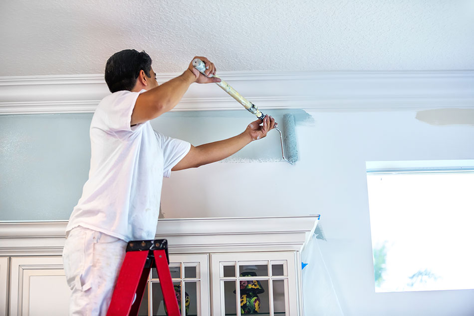 painting contractor painting interior of home